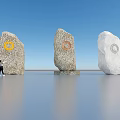 Three Stone Sculptures With Circular Carved Designs And People Beside Under Blue Sky