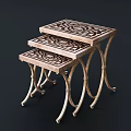 Elegant Nesting Side Tables with Intricate Patterned Tops and Curved Metal Legs