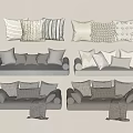 Neutral Toned Sofas With Various Textured Pillows And Throw Blankets