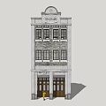 Vintage Style Three Story Commercial Complex With Arched Top Gray Facade And Entrance