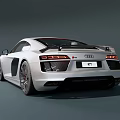 Silver Audi R8 Two Door Sports Car With Sleek Exterior And Alloy Wheels