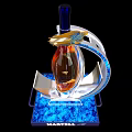 Martell Bottles and Whiskey Glasses with Amber Liquid in Silver Curved Stands on Blue Bases
