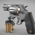 Silver Revolver With Open Cylinder And Bullets On Gray Surface