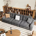 Elegant Grey Sofa Set With Decorative Cushions Bookshelf Stone Wall And Fireplace