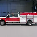 Ford Heavy Duty Fire Truck With Red And White Exterior In Garage Setting