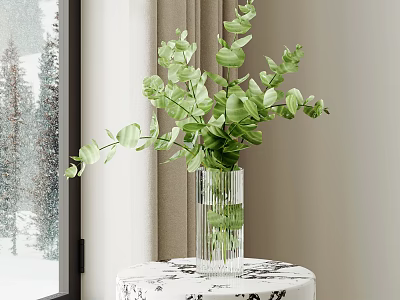 Fresh Green Eucalyptus Leaves in Transparent Glass Vase on Patterned Table Near Window 3d model