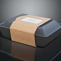 Fresh Food In Black Container With Cork Band White Label And Green Text
