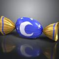 Blue Candy With White Moon And Stars Design And Gold Wrapping