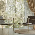 Woven Accent Chairs With Golden Legs By Window Curtains On Wooden Floor And Rug