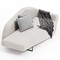 Curved Light Gray Sofa with Geometric Pattern Pillows Dark Throw Blanket and Black Metal Legs