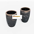 Two Black Ceramic Pots With Handcrafted Texture And Cylindrical Open Mouth Design