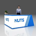 Blue and White Exhibition Reception Desk with NUTS Logo Female Staff Potted Plant Stone Decoration