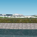 Garden Landscape With Waterfront Stone Retaining Wall Green Lawn Trees And Pedestrian Path