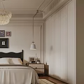 Elegant Bedroom Interior With White Bed Black Headboard Chandelier Crown Molding And Framed Art