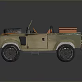 Khaki Colored Open Top Military Vehicle With Spare Tire And Orange Seats