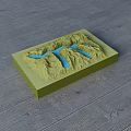 3D Terrain Model Business Equipment Featuring Green Mountains And Blue Water On Wooden Floor