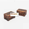 Two Small Ornate Wooden Boxes With Intricate Carved Floral Patterns
