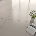 Light Beige Floor Tiles With Glossy Surface And Potted Plant Nearby