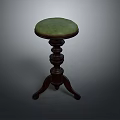 Elegant Single Chair with Green Cushion and Dark Wooden Carved Base
