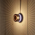 Elegant Modern Wall Lamp on Wooden Wall with Radiant Warm Light Effect