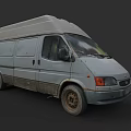 Old Gray Commercial Van With Worn Tires Side Windows And Weathered Exterior