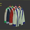 Various Colored Long Sleeve Shirts With Contrast Cuffs And Collars On Hangers