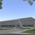 Modern Industrial Factory Building With Large Glass Windows And Landscaped Exterior