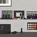 Colorful Perfume and Cosmetics Display with Eyeshadow Palettes Nail Polish Bottles and Makeup Brushes