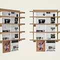 Two Wooden Bookshelves With Multiple Shelves Holding Newspapers Magazines And Patterned Cloth Bag Hanging Below