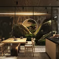 Modern Tea House With Glass Curtain Walls Surrounded by Green Trees and Wooden Tables Chairs