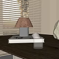 Modern Table Lamp On Desk With Window Blinds Books Glass And Stone Decoration