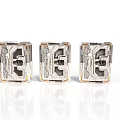 Three Transparent Metallic Cube Components With Intricate Geometric Patterns And Shiny Surfaces