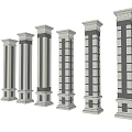 Classical Decorative Columns With Stone Carvings And Architectural Details Against Blue Sky