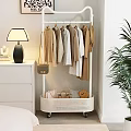 Modern Clothes Rack With Hanging Neutral Colored Clothes And Storage Basket In Cozy Bedroom