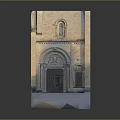 Classical Stone Entrance Gate with Arched Doorway and Carved Decorations on Historic Building Facade