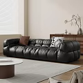 Modern Black Leather Large Sofa With Accent Pillows Round Coffee Table And Wooden Cabinet Decor