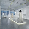 Wedding Dress Store Interior With Bridal Gowns Displayed On Mannequins And Modern Lighting