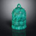 Ancient Bronze Bell With Turquoise Green Patina Intricate Carvings Circular Patterns And Ornate Handle