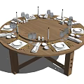 Elegantly Set Round Wooden Dining Table With Plates Cutlery Candles And Wine Glasses