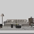 Modern Beige Living Room Sofa With Cushions And Coffee Table With Fruits Book On Rug