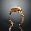 Elegant Gold Open Cuff Bracelet With Intricate Carvings And White Gemstone