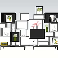 Modern Black White Decorative Cabinet With Multi Tiered Cubes Framed Pictures Pink Plants And Ornaments
