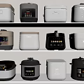 Various Styles of Rice Cookers and Pressure Cookers on White Kitchen Shelves with Digital Panels