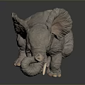 Cute Elephant Sculpture In Sitting Pose With Raised Trunk Large Ears And White Tusks