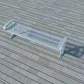 Metal Outdoor Bench With Perforated Design On Gray Stone Tile Floor