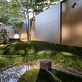 Modern Courtyard Garden Design With Outdoor Seating Green Plants And Ambient Lighting