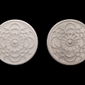 Two Ornate White Circular Ceiling Medallions With Floral Pattern Design