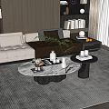 Modern Living Room Featuring Marble Coffee Table With Green Plants Decorative Items And Books