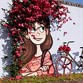 Charming Photo Check-in Spot With Girl Mural Red Flowers And Bicycle