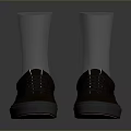 Pair of Brown Casual Shoes with White Socks Black Laces and Yellow Insoles